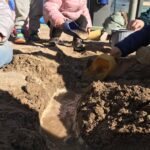 joc amb aigua i sorra